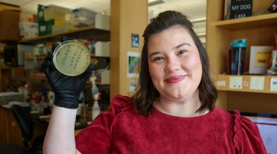 Hollyn Franklin holding a petri dish