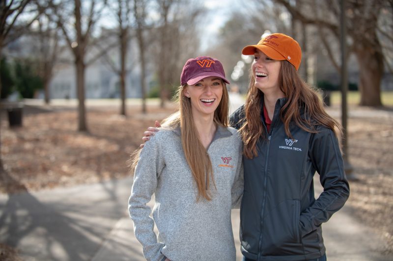 Girls with Virginia Tech hat and sweatshirt