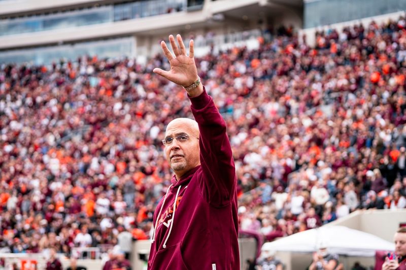 James Franklin waves to the crowd in Lane Stadium.  