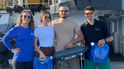 This image shows four people with Jeremy Jenrette on the far right.