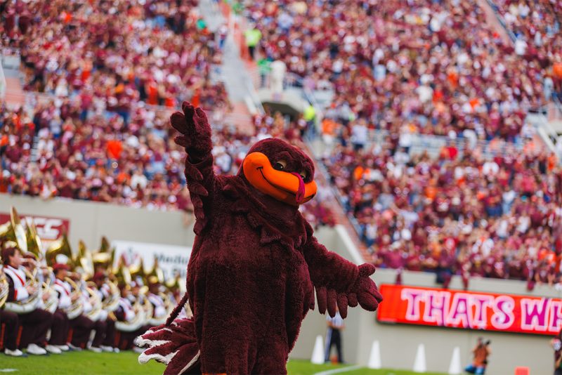 The HokieBird cheering on the crowd at the Homecoming 2023 football game